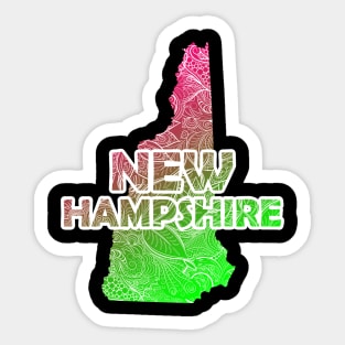 Colorful mandala art map of New Hampshire with text in pink and green Sticker